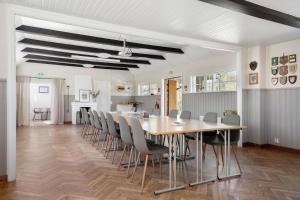 a dining room with a table and chairs at Tylebäck Hotell & Konferens, BW Signature Collection in Halmstad