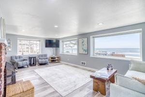 a living room with a view of the ocean at Serendipity -A Happy Surprise Unit A in Oceanside