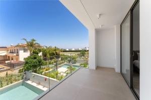 a view from the balcony of a house at PANKI Beach Villa Protaras in Protaras +65 photos