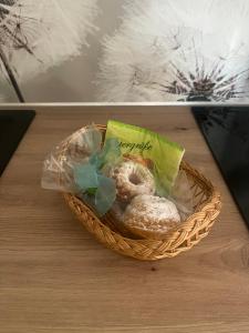 two donuts in a basket on a table at PusteBlume in Bückeburg