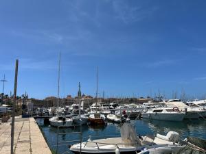 a bunch of boats docked in a harbor at Logudoro Cabin by Holiday World in Alghero