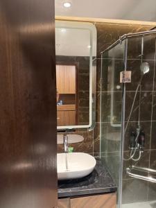 a bathroom with a sink and a mirror at 7Homestays in Ðông Khê +55 photos