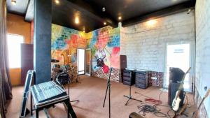 a recording studio with a mural on the wall at cassiopeia escape in Kottawa