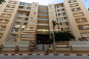 a building in the city of dubai at VIP Home in El Aouina Station