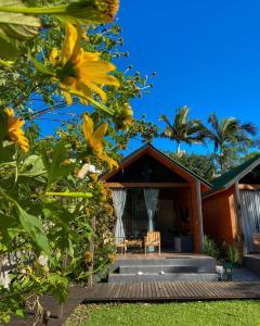 a house with a pathway to the front of it at Casa do Sossego in Florianópolis