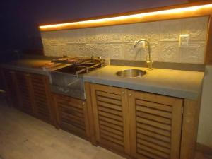 a kitchen with a sink and a counter top at Oceanview 2BR with Terrace in Punta Hermosa in Punta Hermosa