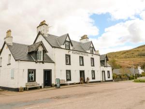 a white building on the side of a road at Kilmartin View in Lochgilphead
