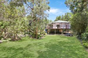 an image of a house with a yard at Salty Beach in Amity Point