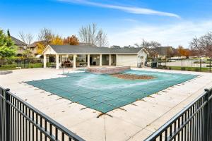 a house with a swimming pool in a yard at Highland Haven by Settler's Park in Meridian