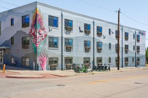 a large building with a kite in front of it at Kasa LoHi Denver in Denver