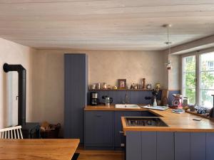a kitchen with a sink and a counter top at Romantisches Dinkelsbühler Altstadthäuschen inklusive Badewanne in Dinkelsbühl +27 photos