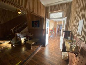 an overhead view of a living room with a staircase at Hostal Ochen in Punta Arenas