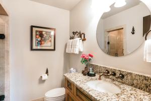 a bathroom with a sink and a mirror at 104 Highlands Westview in Avon +46 photos