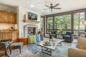 a living room filled with furniture and a fireplace at 104 Highlands Westview in Avon
