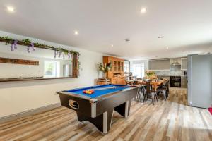 a living room with a pool table in it at 6 Bed in Holsworthy oc-s41430 in Merryfield