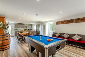 a living room with a pool table in it at 6 Bed in Holsworthy oc-s41430 in Merryfield
