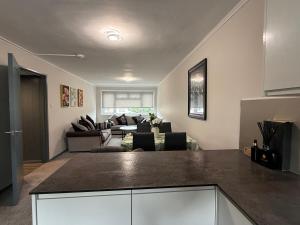 a kitchen and living room with a living room at Beautiful Spacious Flat in Oxford