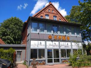 a building with a lot of windows at Apartment Wallblick in Nienburg