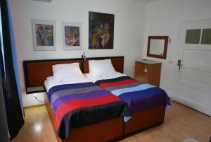Postel nebo postele na pokoji v ubytování Rooms Bytom