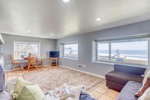 a living room with a view of the ocean at Serendipity - Whole in Oceanside