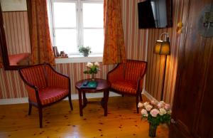 TV a/nebo společenská místnost v ubytování Hotel Ærø