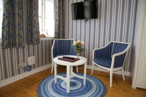 TV a/nebo společenská místnost v ubytování Hotel Ærø