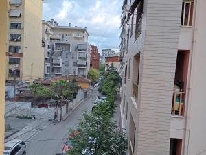 a view of a city street from a building at Enjoy Hostel in Tirana