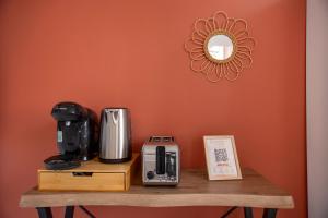 a wooden table with appliances on top of it at Studio Equerre in Toulon
