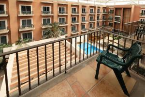 a balcony view of a building with a pool at Holiday Inn Express - Monterrey - Tecnologico by IHG in Monterrey