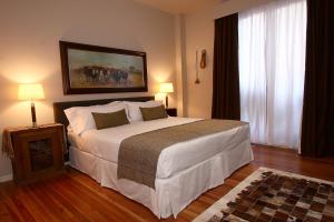 Postel nebo postele na pokoji v ubytování Legado Mitico Buenos Aires