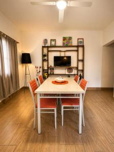 a dining room with a table and chairs at Hospedaje Don Felipe in Belén