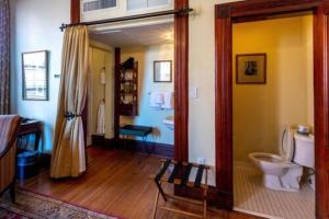 a bathroom with a toilet and a sink at Kehoe House, Historic Inns of Savannah Collection in Savannah +117 photos