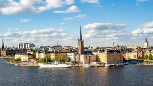 a view of a city with a river and buildings at Ruby Frida Hotel Stockholm by IHG in Stockholm