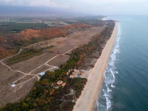 an aerial view of an island in the ocean at Casa Sal by Tasman in Puerto Escondido