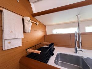a kitchen with a sink next to a sink at ΡΕΝΤ ΜΕ ΟΥΤ Σιμπα in Kavála +20 photos