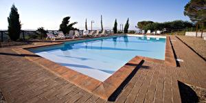 The swimming pool at or close to AgriResort Spa Glamping Poggio Di Montedoro