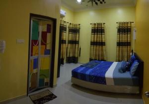 เตียงในห้องที่ DBukit Losong Villa Kuala Terengganu