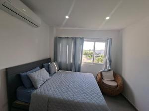 a bedroom with a bed and a window at Venice House, Costa del Sol in San Luis La Herradura +46 photos