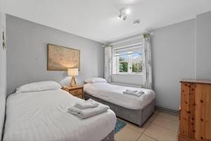 a bedroom with two beds and a window at 2 Bed in Alkham oc-p34785 in Swingfield