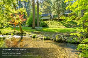 a poster of a house in the woods next to a river at Secluded River Cabin Near Sly Park & Apple Hill in Placerville