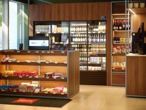a store with a display of food and drinks at Ibis Praha Wenceslas Square in Prague