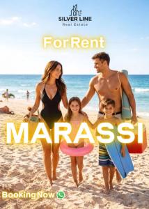 a poster of a family walking on the beach at Marassi in El Alamein +1 photo