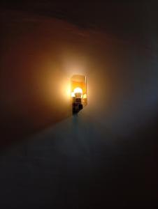 a light that is on top of a wall at SEE CHAIN Resort in Digana