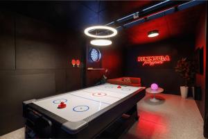 a room with a ping pong table in a room at Zen Haven with Sauna & Spa in Tootgarook