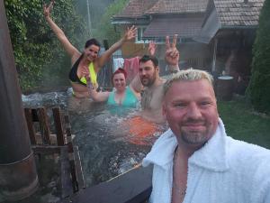 a group of people in a hot tub at Casa Rei in Vidolm