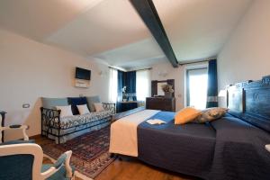 Ein Bett oder Betten in einem Zimmer der Unterkunft Agriturismo Rivella