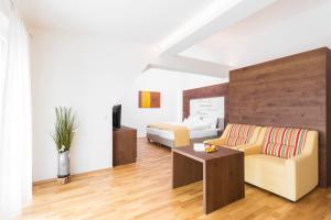 Posteľ alebo postele v izbe v ubytovaní Joglland Hotel Prettenhofer