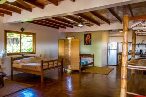 Postel nebo postele na pokoji v ubytování Canoa Suites