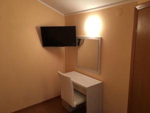 TV a/nebo společenská místnost v ubytování Guest House Sandra