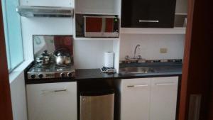 Kitchen o kitchenette sa Familia Tome